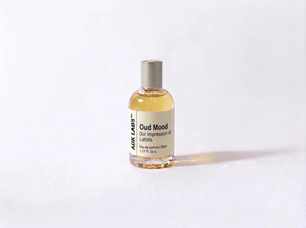 Our Impression of  Oud Mood Lattafa Perfumes for women and men
